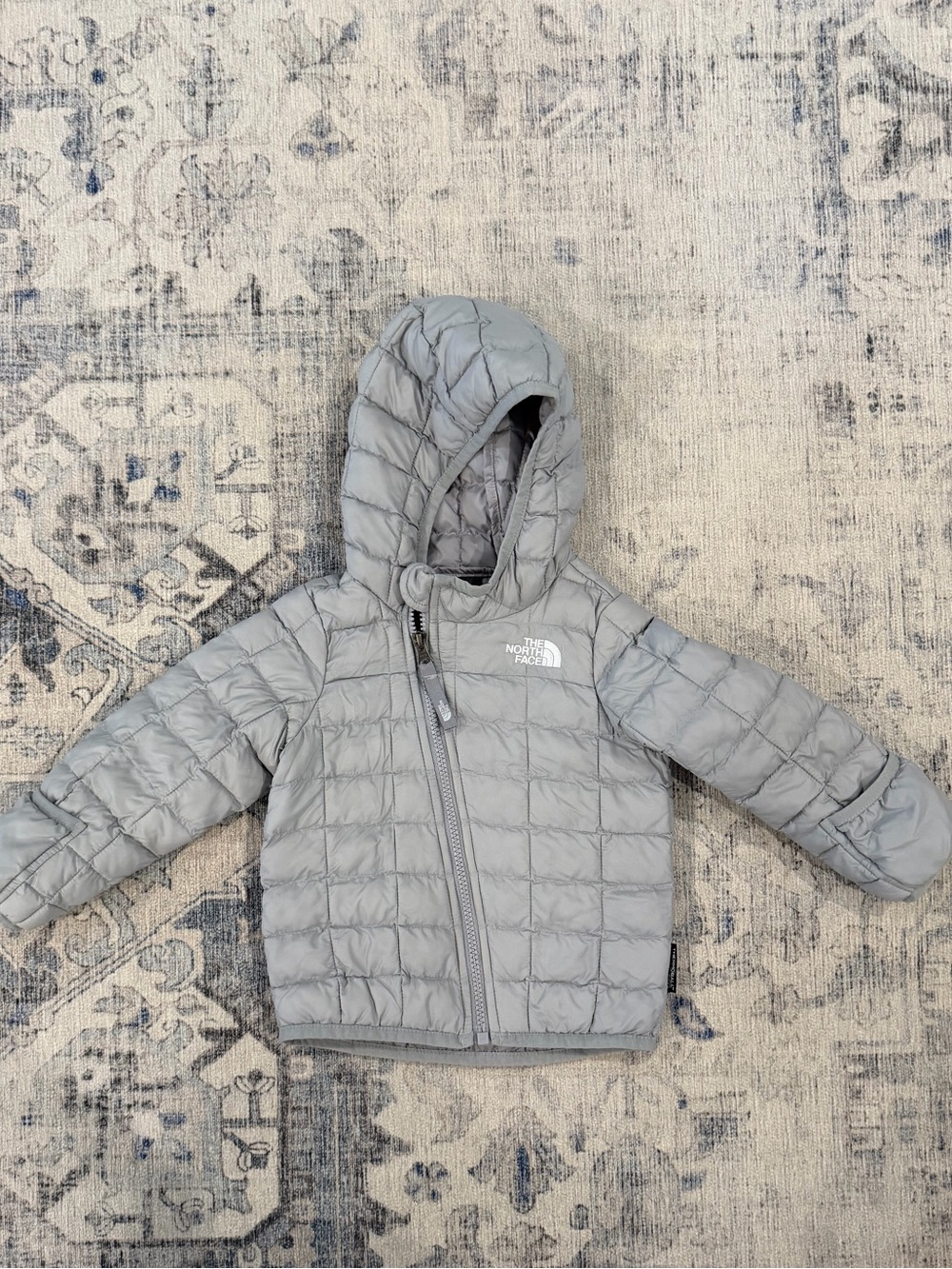 The North Face Kids Light Gray Puffer Jacket with hood